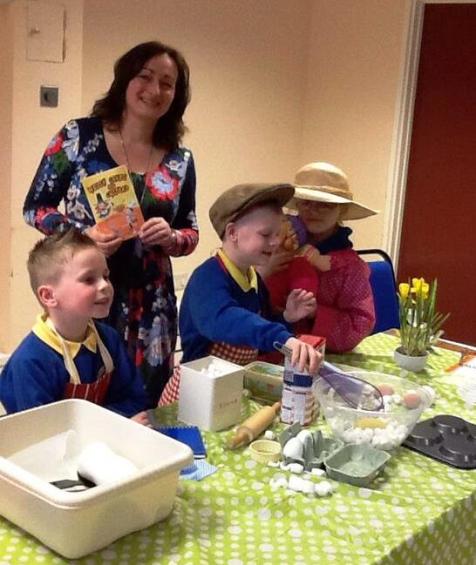 Richmond Park School children dressed as Emyr Rhys, Da-cu and Nain making Welsh cakes