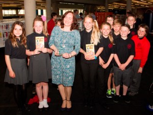 Wendy with children from St Andrew's School at,Cardiff Central Library